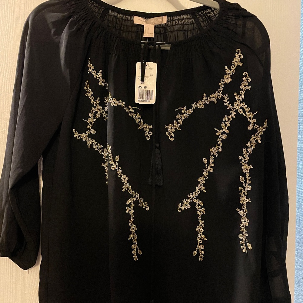 Black and gold top